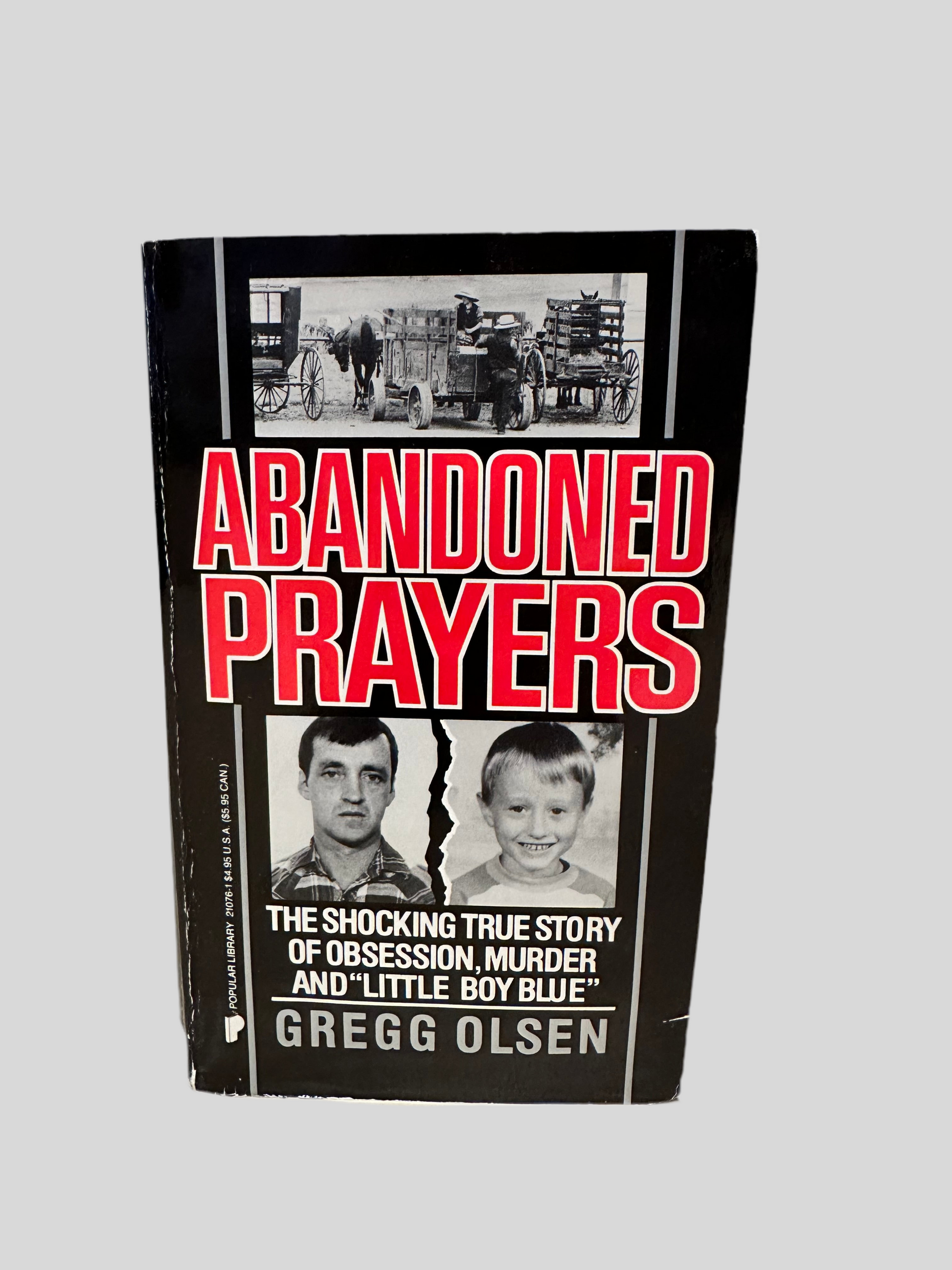 Front cover of 'Abandoned Prayers' by Gregg Olsen, displaying the title in bold red and white text with images of the main subject, Eli Stutzman, and a young boy, Danny, below a black-and-white image of an Amish community.