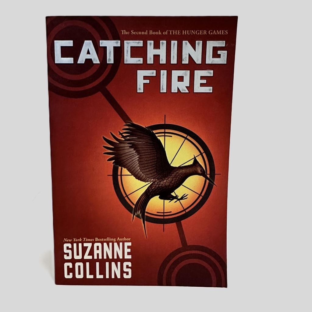 Catching Fire by Suzanne Collins - Fehmerling Books